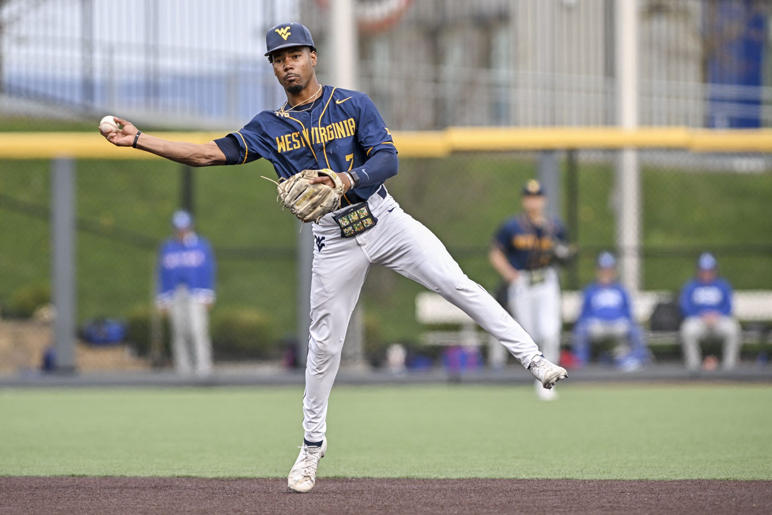 No. 18 Oklahoma State uses big 8th inning to avoid a sweep by WVU